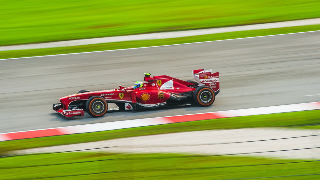 Red race car motion blur #2 free wallpaper - medium preview image