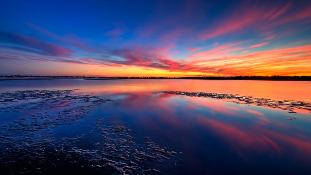Sunset water clouds waves cityscape free wallpaper - medium preview image