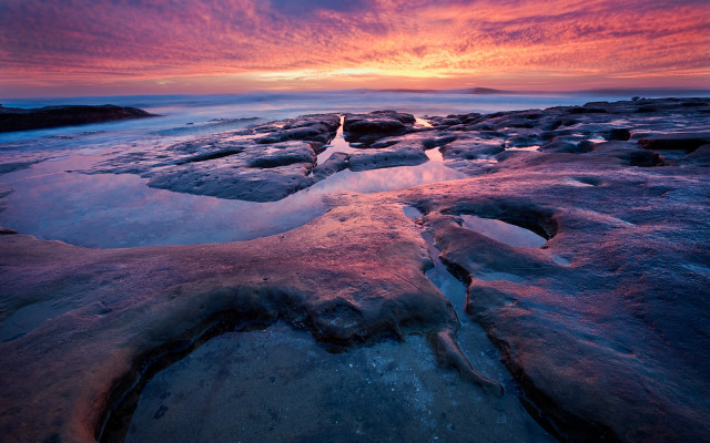Sunset rocky beach ice water free wallpaper - medium preview image