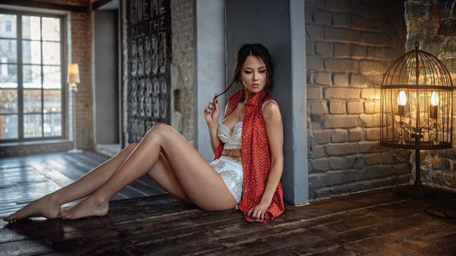 Woman sitting brickwall redscarf fashion free wallpaper - medium preview image