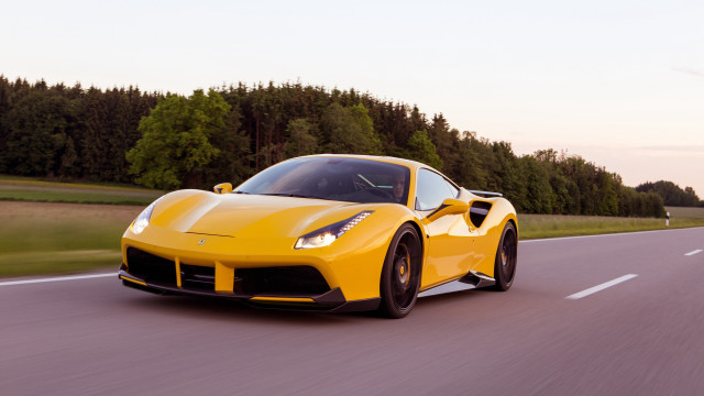Yellow sports car driving forest free wallpaper - medium preview image