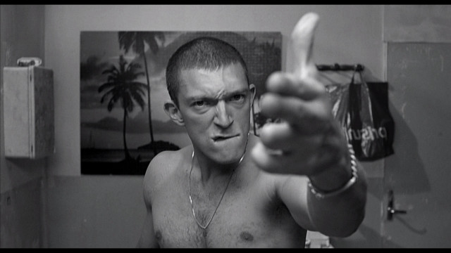 Man necklace gun camera bathroom free wallpaper - medium preview image