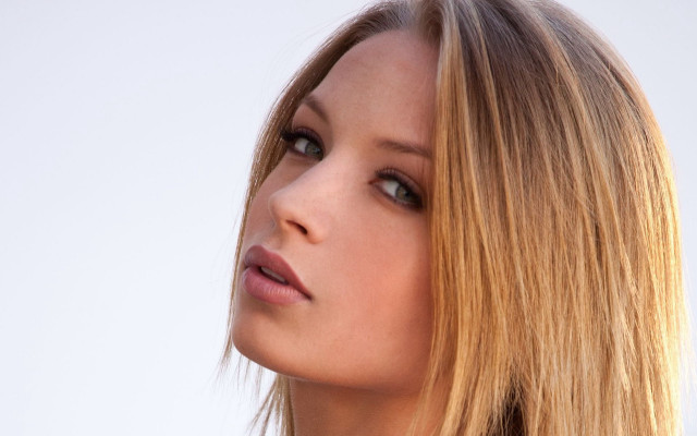 Blonde woman serious portrait naturalism free wallpaper - medium preview image