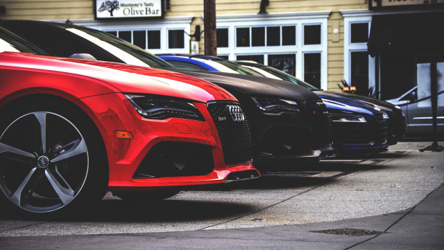 Parked cars street corner building free wallpaper - medium preview image