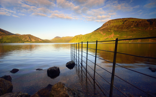 Fence water mountains beach city free wallpaper - medium preview image