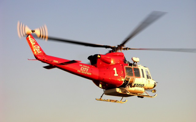 Red helicopter blue sky pilot free wallpaper - medium preview image