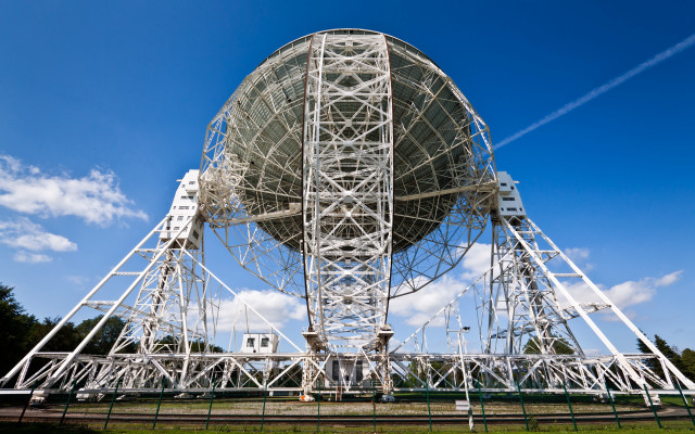 Satellite dish green field urban free wallpaper - medium preview image