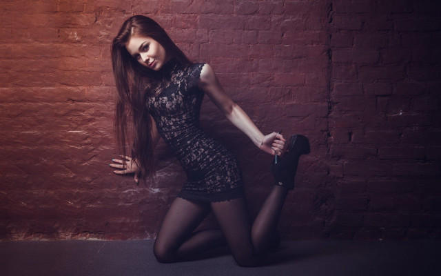 Woman black dress gun brick free wallpaper - medium preview image