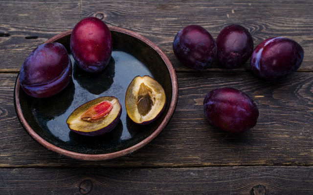 Plums bowl wooden table harlem free wallpaper - medium preview image