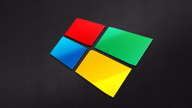 Windows logo closeup black surface free wallpaper - medium preview image