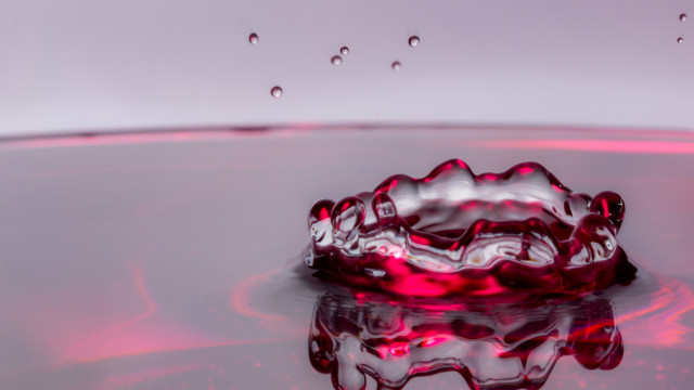 Red liquid floating water drops free wallpaper - medium preview image