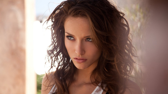 Woman longhair whiteshirt wind portrait free wallpaper - medium preview image