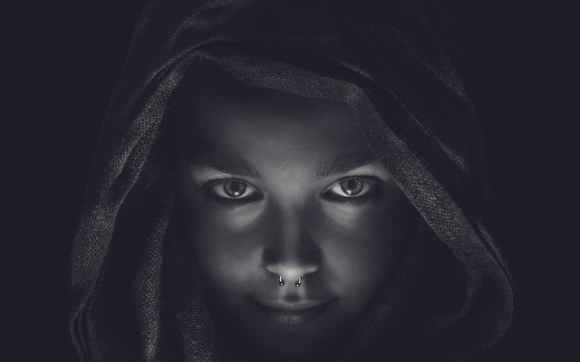 Creepy hooded woman nose piercing free wallpaper - medium preview image