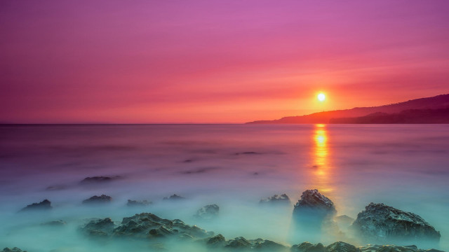 Sunset water rocks mountain mystical free wallpaper - medium preview image