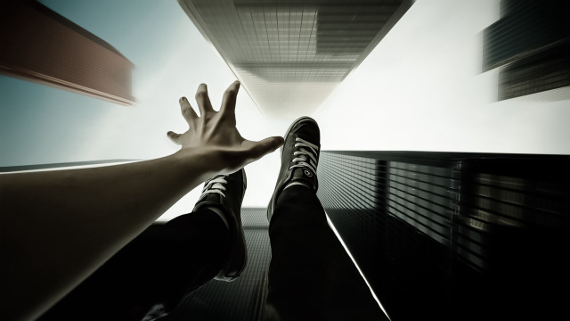 Hand reaching highrise sky feet free wallpaper - medium preview image