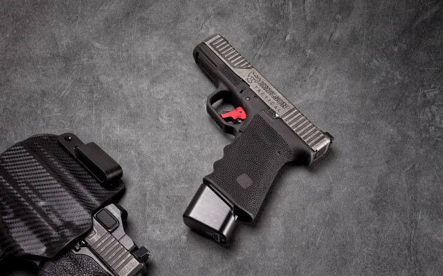 Gun holster gray background red free wallpaper - medium preview image