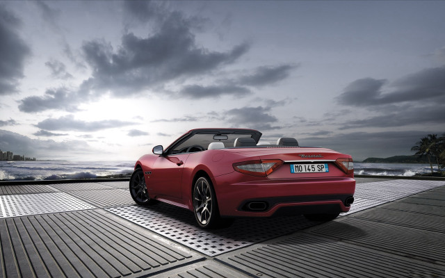 Red sports car ocean deck free wallpaper - medium preview image
