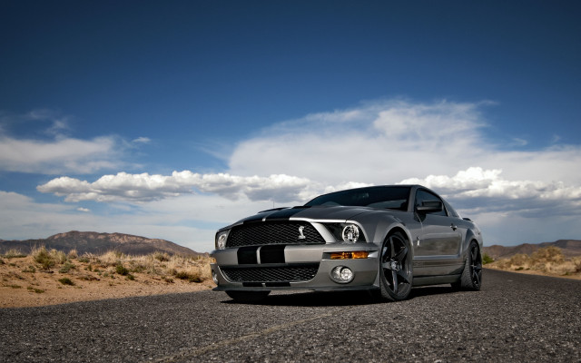 Silver mustang desert road clouds free wallpaper - medium preview image