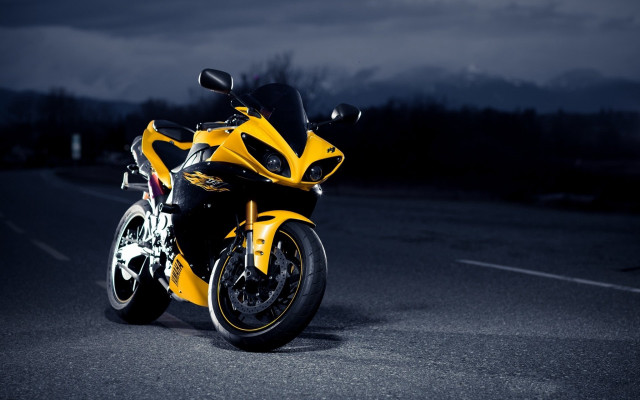 Yellow motorcycle night city lights free wallpaper - medium preview image