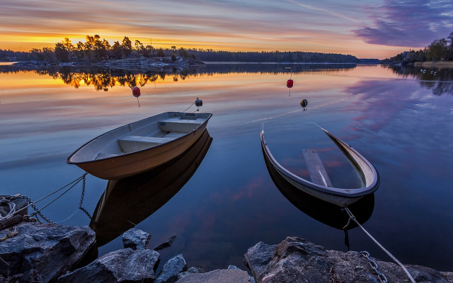 Boats rocks dock sunset ocean free wallpaper - medium preview image