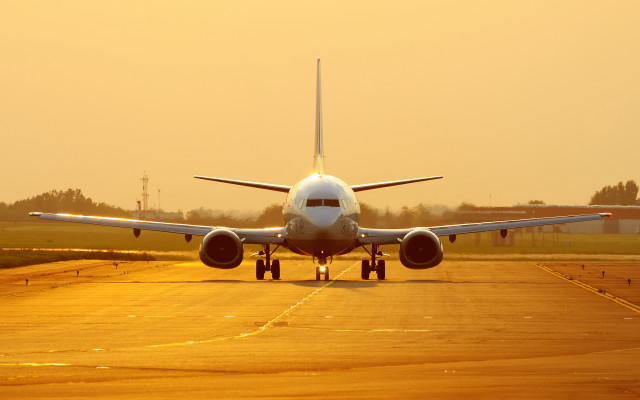 Large jetliner runway sunset backlit #2 free wallpaper - medium preview image
