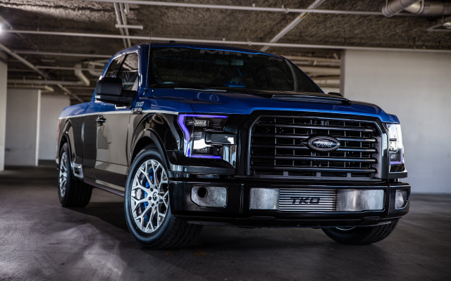 Blue truck garage black roof free wallpaper - medium preview image