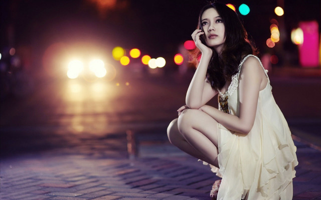 Woman curb night cellphone city free wallpaper - medium preview image