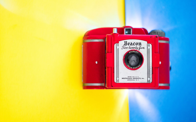 Red camera yellow blue wall free wallpaper - medium preview image