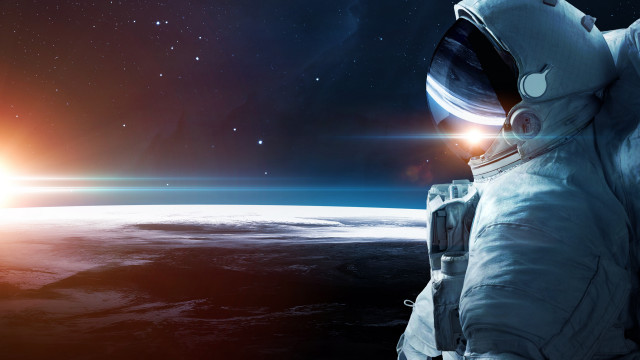 Astronaut sun stars distant planet free wallpaper - medium preview image