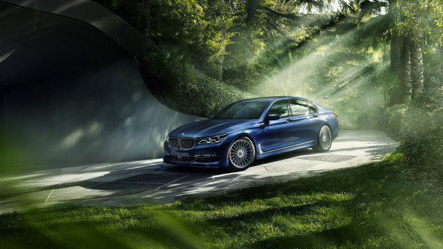 Blue car forest road rimlight free wallpaper - medium preview image
