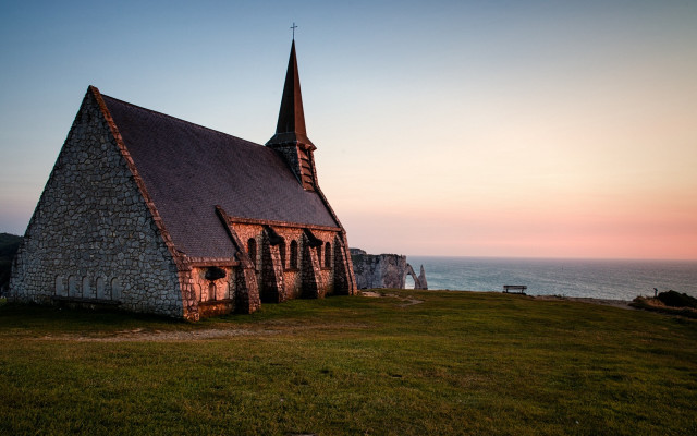 Church steeple grassy hill ocean free wallpaper - medium preview image