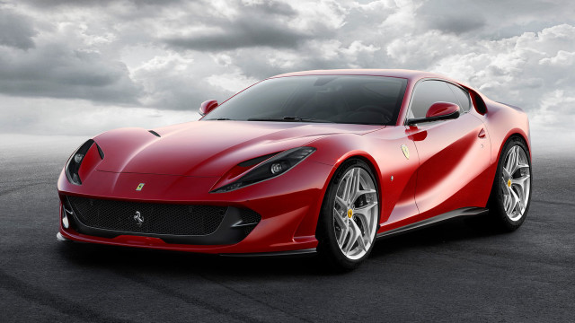 Red sports car cloudy day #2 free wallpaper - medium preview image