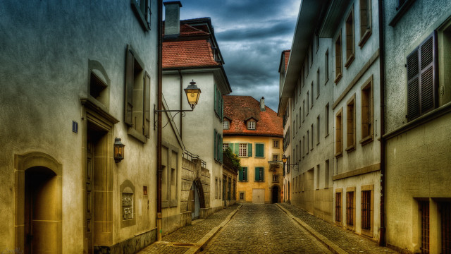 Narrow street lamp post cobblestone free wallpaper - medium preview image