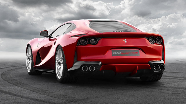 Red sports car cloudy sky #5 free wallpaper - medium preview image