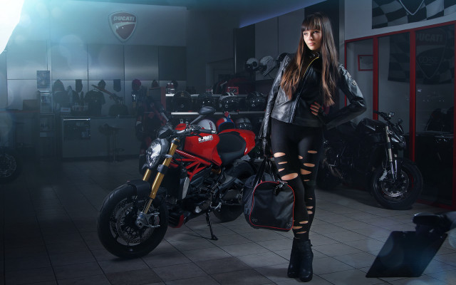 Woman motorcycle garage jigsaw puzzle free wallpaper - medium preview image