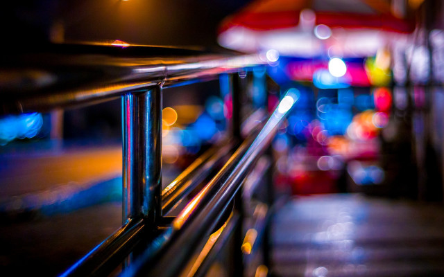 Metal railing red umbrella night free wallpaper - medium preview image