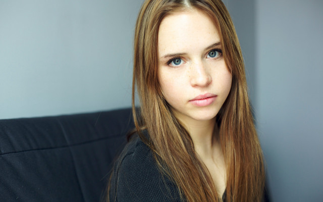 Woman longhair couch serious brownrealistic free wallpaper - medium preview image