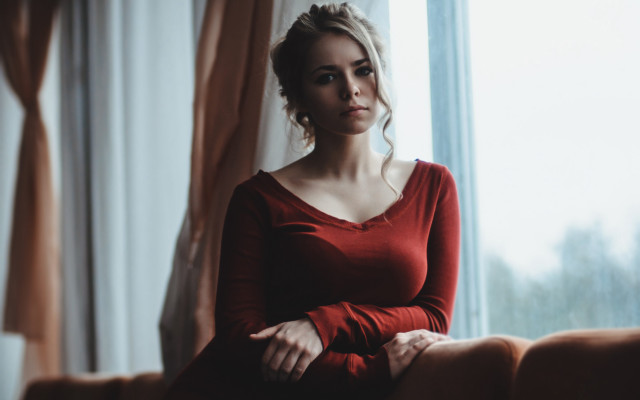 Woman couch window portrait blurry free wallpaper - medium preview image