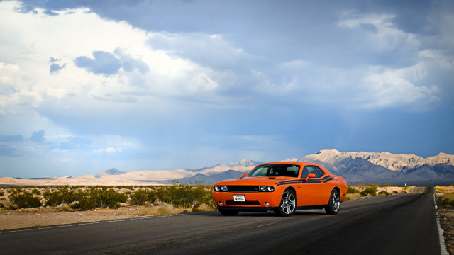 Orange car desert mountains tilt free wallpaper - medium preview image