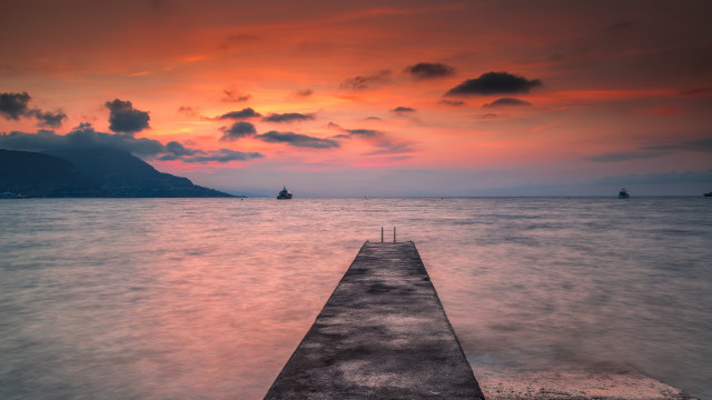 Long dock ocean sunset mountain free wallpaper - medium preview image