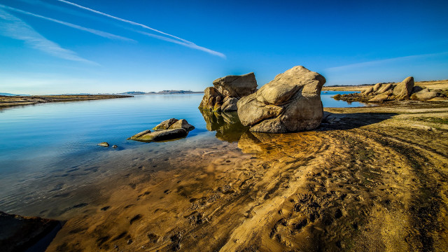 Large rock beach water sky free wallpaper - medium preview image