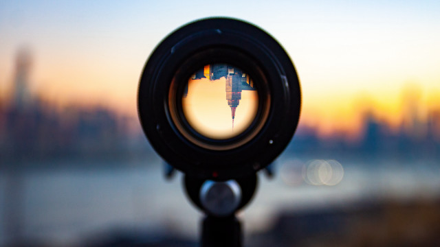 Camera lens city sunset reflection free wallpaper - medium preview image