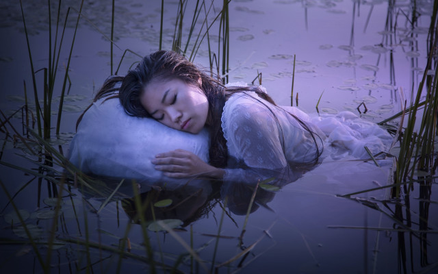 Woman laying water pillow dreamlike free wallpaper - medium preview image