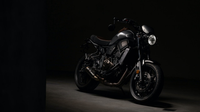 Motorcycle spotlight dark background neoclassicism free wallpaper - medium preview image