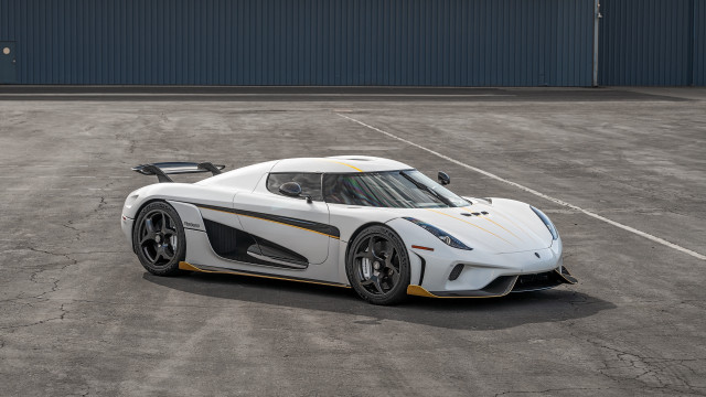 White sports car parking lot #2 free wallpaper - medium preview image