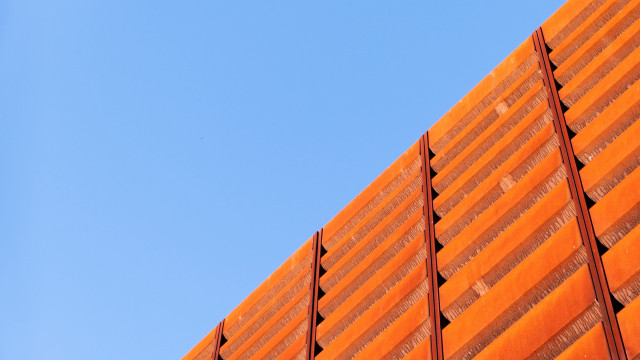 Red building blue sky plane free wallpaper - medium preview image