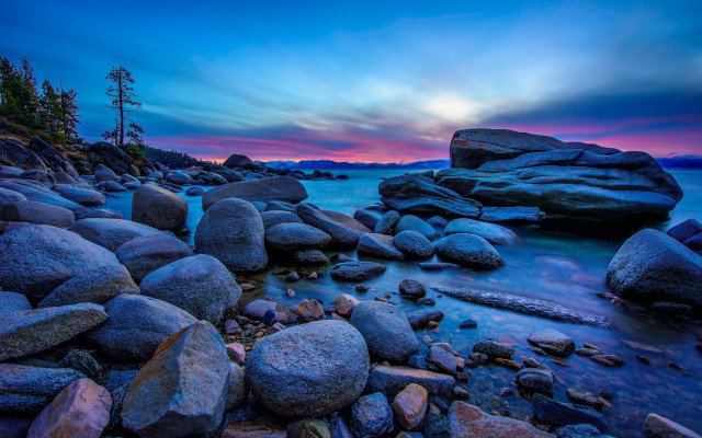 Rocky beach sunset trees lake free wallpaper - medium preview image