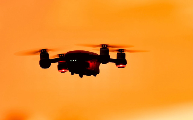 Black red flying yellow background free wallpaper - medium preview image