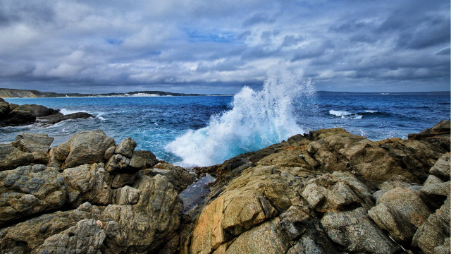 Wave rocks ocean cloudy sky free wallpaper - medium preview image