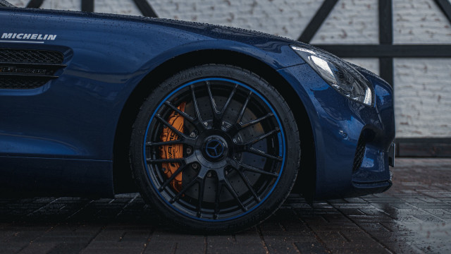 Blue sports car brick wall #2 free wallpaper - medium preview image